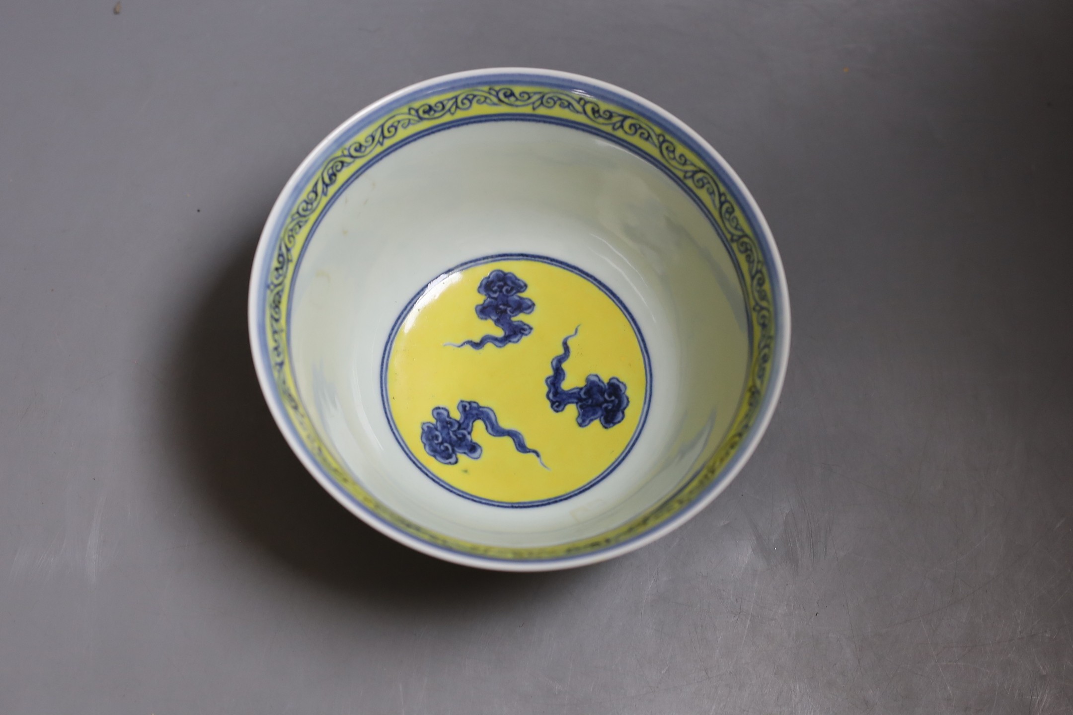 A Chinese yellow ground ‘dragon’ bowl, diameter 17cm